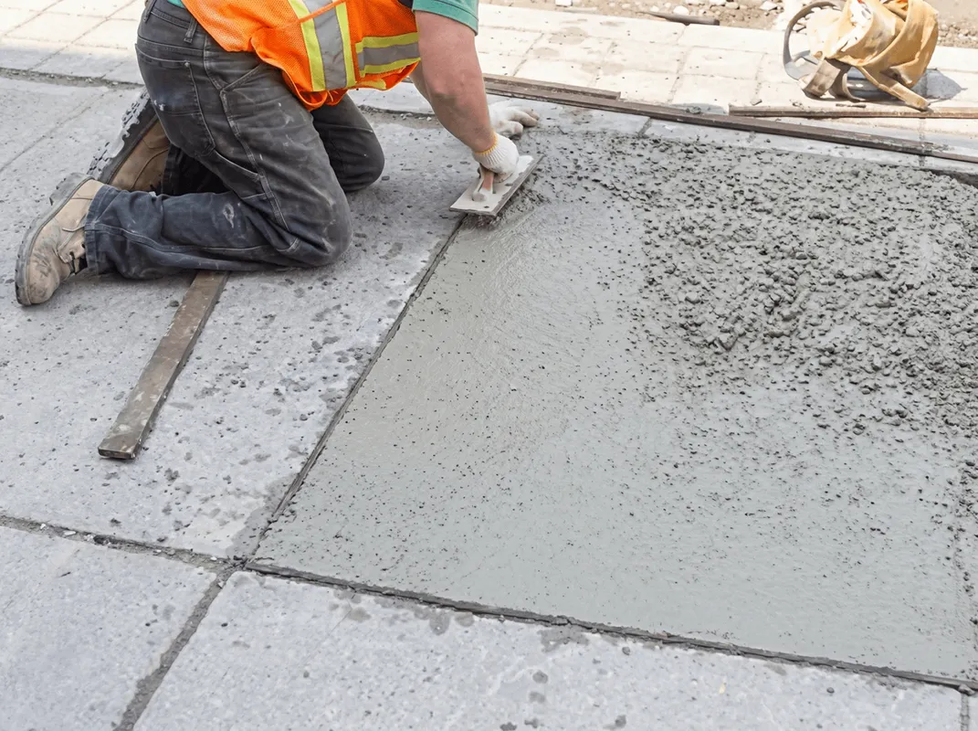 Professional repairing a concrete floor in Bradenton, FL
